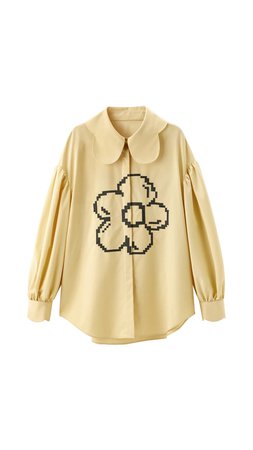 yellow blouse with flower