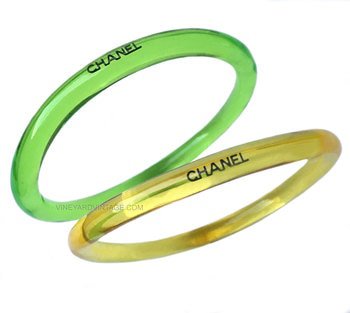 CHANEL SET OF TWO YELLOW & GREEN LUCITE BANGLES