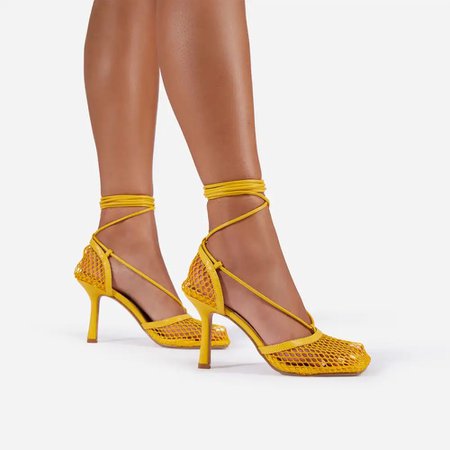 yellow lace up fishnet heels