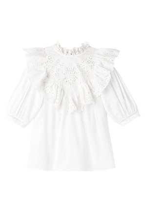A ruffled blouse with unique signature eyelet.