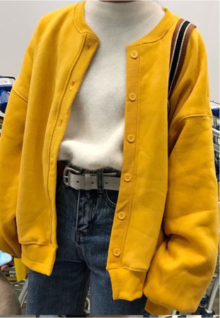 yellow cardigan