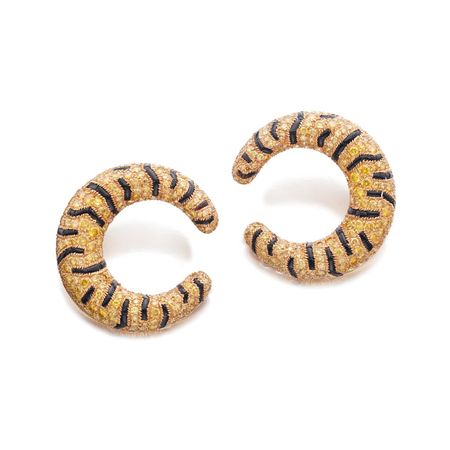 Cartier Pair of diamond and onyx ear clips, 'Tiger' |  Magnificent Jewels and Noble Jewels | | Sotheby's