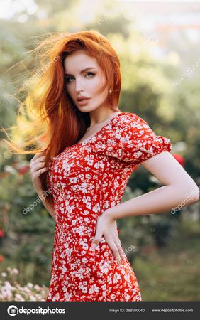 Beautiful Red Haired Girl Short Red Dress Posing Summer Garden Stock Photo by ©irinanevaa.gmail.com 388500040