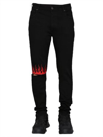 Black jeans with red flame cuff