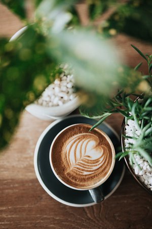 green ceramic cappuccino cup photo – Free Coffee cup Image on Unsplash