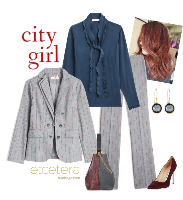 Executive Style: Intellectual plaid two-piece suit, and Cultural blue blouse.